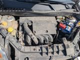 a car engine with a bunch of batteries in it