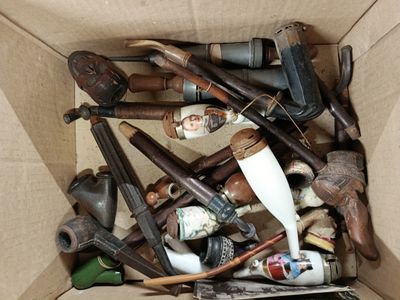 a cardboard box filled with different types of tools