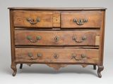 a wooden chest of drawers on a white background