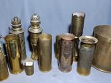 many different types of brass items on the table