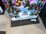 a large poster on the floor in front of a store