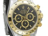 rolex watch with black dial and two tone gold bezel