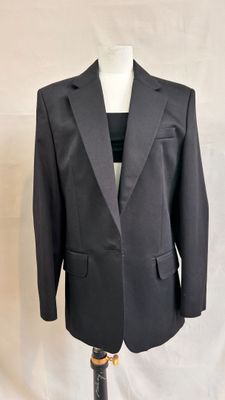 a close up of a suit on a mannequin mannequin mannequin mannequin mannequin mannequin mannequin mannequin