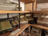 many different types of cash register on the shelves