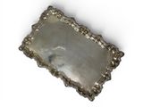 an antique silver tray on a white background with a white background