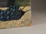 a picture of a painting of grapes on a table