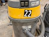 a yellow and black dust collector and a black and yellow vacuum