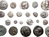 an image of a collection of ancient roman coins on a white background