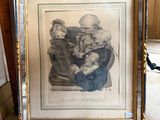 an old picture of a man holding a baby in a frame