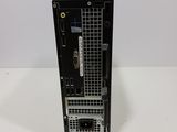 a close up of a computer tower on a white surface