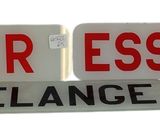 two street signs that say super essence and melange