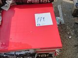 two pizza boxes sitting on top of each other on the ground