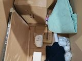 a cardboard box with a lot of items inside of it
