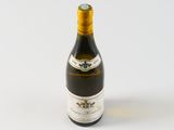 a bottle of wine that is sitting on a table