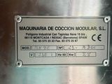 a close up of a sign on a metal surface