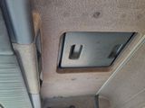 a view of the inside of a vehicle from the driver ' s seat