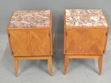 pair of bedside tables with marble tops and wooden legs