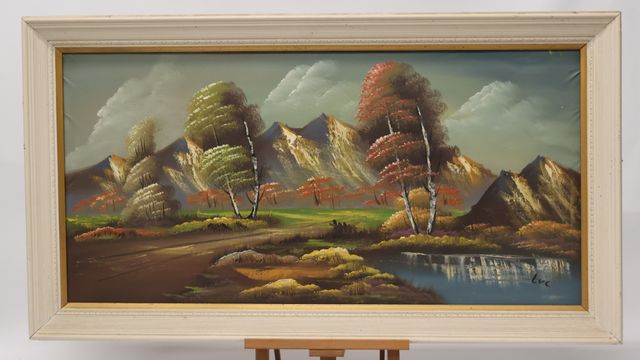 « Paysage de montagne et lac ». Huile sur toile. Signée LUC en ba...