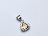 une image représentant un pendentif en forme de diamant jaune et blanc sur fond blanc