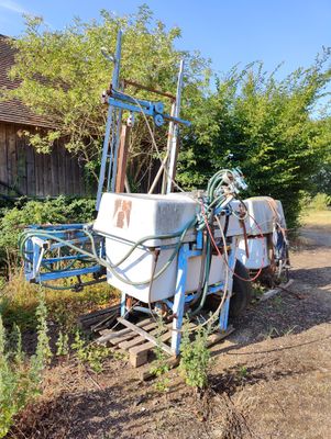 a boat that is sitting on the side of the road