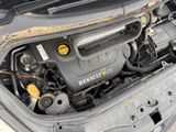 the engine of a car with the hood up and the hood down