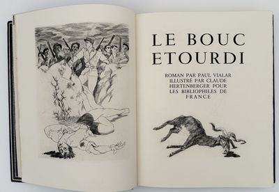 an open book with a drawing of a man and a dog on it