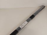 a large black and white object on a white surface