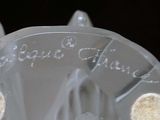 a close up view of a plastic object with writing on it