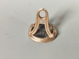 a small metal object that is sitting on a table