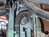 a large machine that is sitting inside of a building