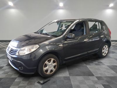 a picture of a grey car parked in a garage