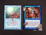 two cards on the table that have a picture on them