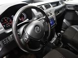 dashboard of a car with a steering wheel and dashboard controls