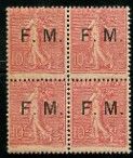 a stamp with four different letters on it