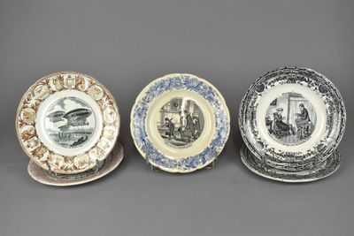 three plates with different designs on them sitting on a table