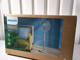 packaging of a philips fan in a cardboard box on a table