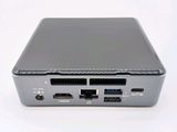 the back of a small computer with two usb ports on top of it