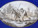 a plate with a picture of a man and a woman on it