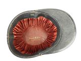 a hat with a ruffled brimle on top of it