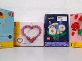 four boxes that have flowers and a heart on them