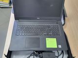 two laptops that are sitting in a bag on the table