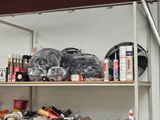 a shelf with many different items on it in a room