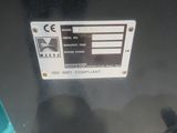a sign on the side of a machine that is not working