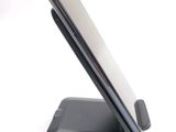 a cell phone that is sitting on top of a stand