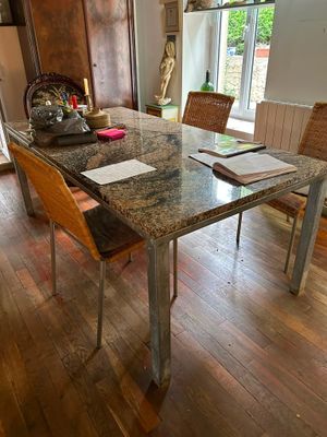 a table that has a book on it in a room