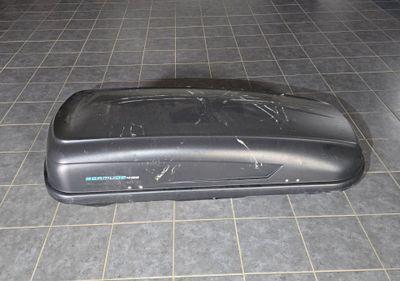 a black box that is on the floor in the room