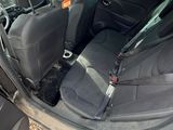 a car that has a seat belt in the back of it