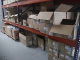 many boxes on the shelves in the warehouse