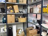many boxes and boxes on the shelves in the room