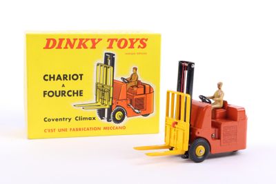 an image of a toy forklift truck with a box on the back